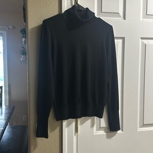Express black turtleneck sweater in a large.